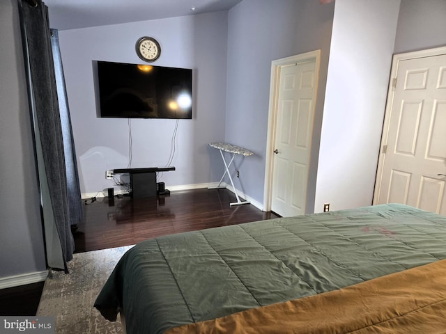 7832 Canter Ct, Severn, MD 21144 - bedroom with wood finished floors, baseboards, and vaulted ceiling