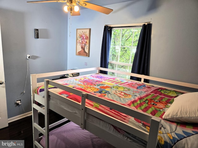 7832 Canter Ct, Severn, MD 21144 - bedroom with dark wood finished floors, ceiling fan, and baseboards