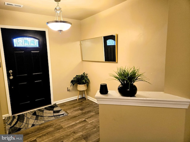 7832 Canter Ct, Severn, MD 21144 - foyer with dark wood-style flooring and baseboards