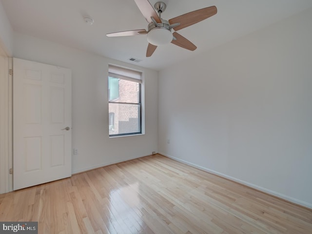 1812 Vernon St NW Unit 42, Washington, DC 20009 - empty room with light wood finished floors, ceiling fan, baseboards, and a smoke detector