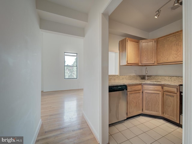 1812 Vernon St NW Unit 42, Washington, DC 20009 - kitchen featuring dishwasher, a sink, baseboards, track lighting, and light wood-style flooring
