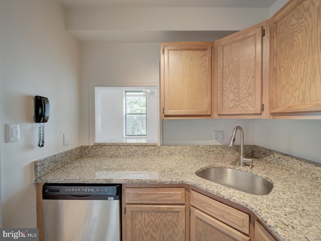 1812 Vernon St NW Unit 42, Washington, DC 20009 - kitchen with stainless steel dishwasher, light brown cabinetry, a sink, and light stone counters