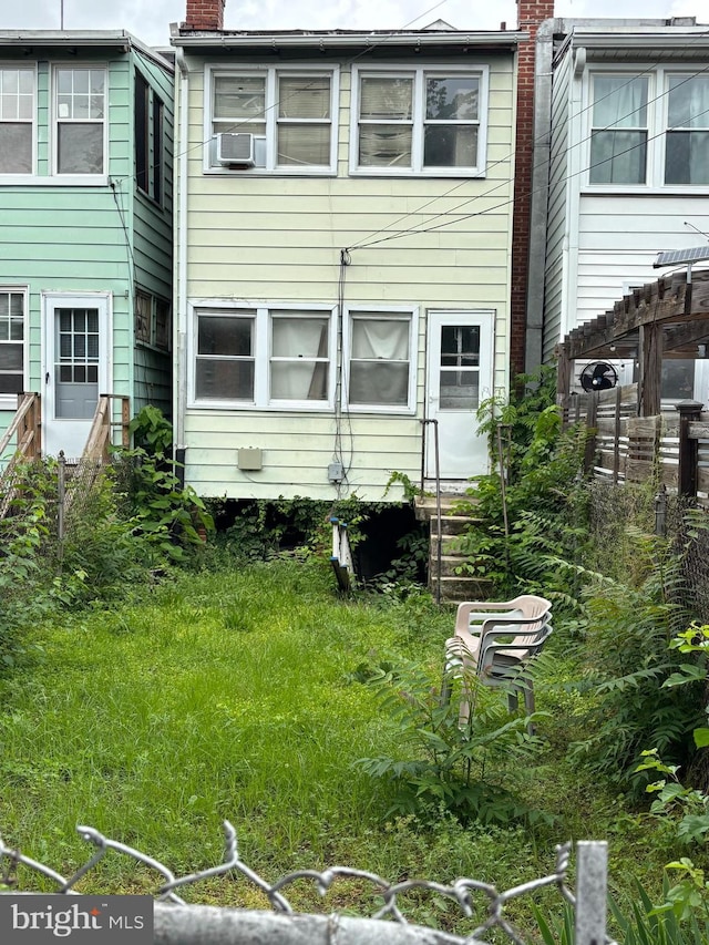 1533 N Carolina Ave NE, Washington, DC 20002 - rear view of house featuring a chimney and cooling unit
