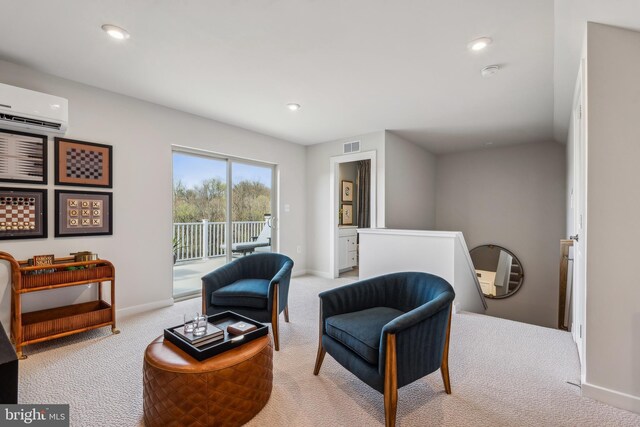 sitting room featuring a wall mounted AC, carpet floors, recessed lighting, and baseboards