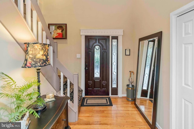 3097 Mill Rd, Doylestown, PA 18902 - entryway featuring light wood-style floors, stairs, and baseboards