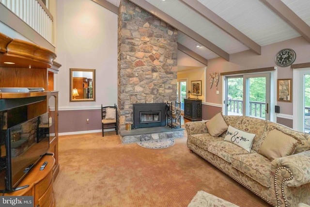 3097 Mill Rd, Doylestown, PA 18902 - carpeted living area featuring a fireplace, beamed ceiling, baseboards, and high vaulted ceiling