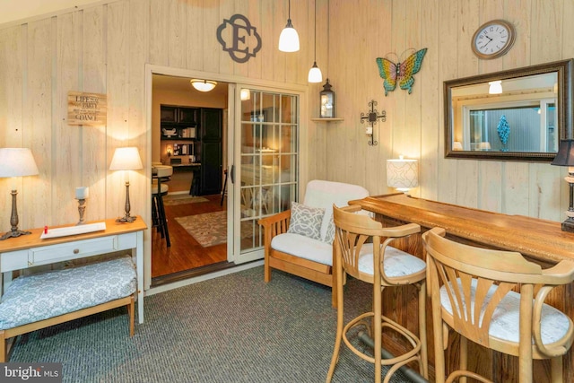 3097 Mill Rd, Doylestown, PA 18902 - dining space featuring wood walls, a desk, and carpet flooring