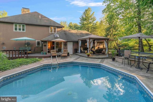 3097 Mill Rd, Doylestown, PA 18902 - outdoor pool featuring outdoor dining space, a gazebo, a patio area, and a wooden deck