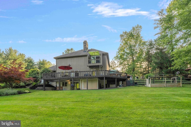 3097 Mill Rd, Doylestown, PA 18902 - back of house with a deck, a lawn, and a chimney