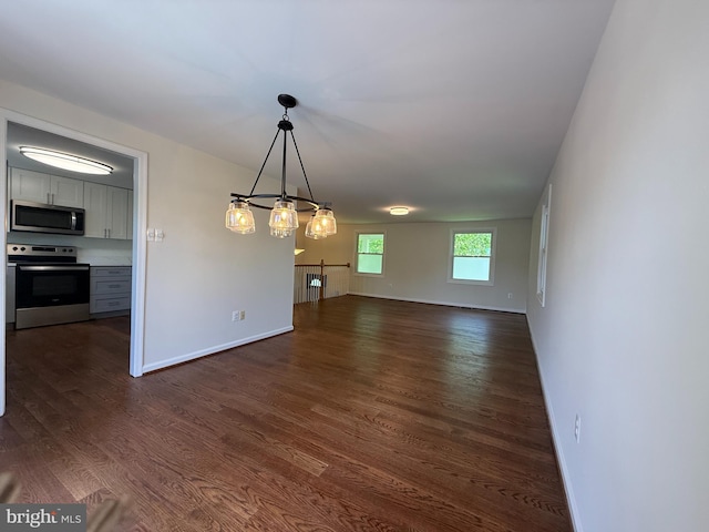 4205 Middle Ridge Dr, Fairfax, VA 22033 - unfurnished dining area featuring dark wood-type flooring, baseboards, and a chandelier