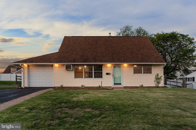 78 Cobalt Ridge Dr Unit E, Levittown, PA 19057 - cape cod-style house with a garage, driveway, a shingled roof, and a wall mounted AC