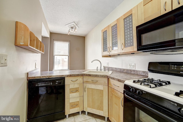1001 Saint Paul St Unit 2D, Baltimore, MD 21202 - kitchen featuring black appliances, light brown cabinets, a sink, a peninsula, and glass insert cabinets