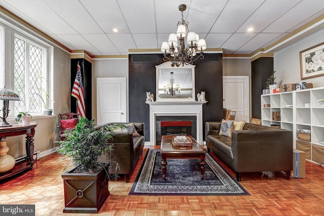 1001 Saint Paul St Unit 2D, Baltimore, MD 21202 - living room with a chandelier, baseboards, a fireplace, recessed lighting, and crown molding