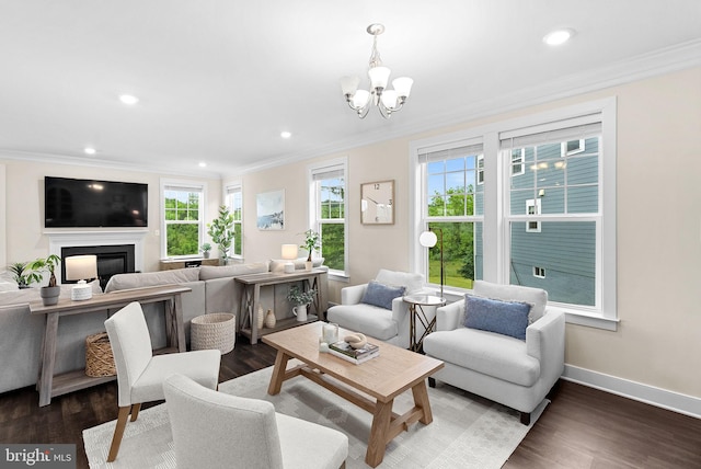 19253 Running Spring Ct, Leesburg, VA 20175 - living area with ornamental molding, wood finished floors, a chandelier, recessed lighting, and baseboards