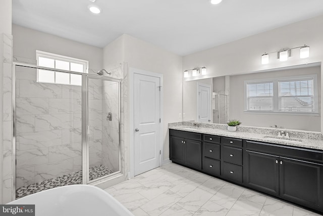 19253 Running Spring Ct, Leesburg, VA 20175 - bathroom featuring a shower stall, marble look tiles, double vanity, a soaking tub, and recessed lighting