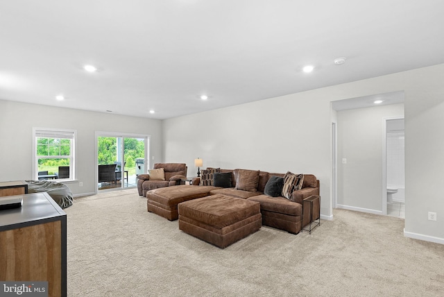 19253 Running Spring Ct, Leesburg, VA 20175 - living area featuring light carpet, baseboards, and recessed lighting