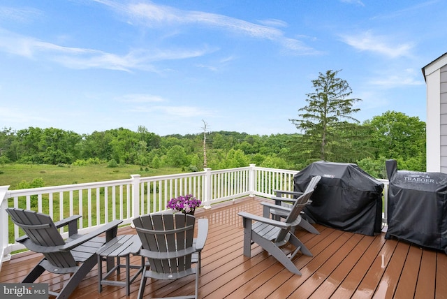 19253 Running Spring Ct, Leesburg, VA 20175 - wooden deck featuring a forest view and grilling area
