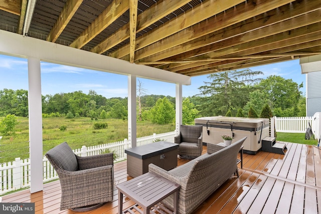 19253 Running Spring Ct, Leesburg, VA 20175 - wooden deck featuring a hot tub, a fenced backyard, and view of scattered trees