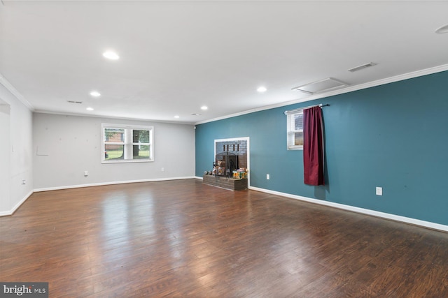 10700 Bickford Ave, Clinton, MD 20735 - unfurnished living room with ornamental molding, recessed lighting, healthy amount of natural light, baseboards, and wood finished floors