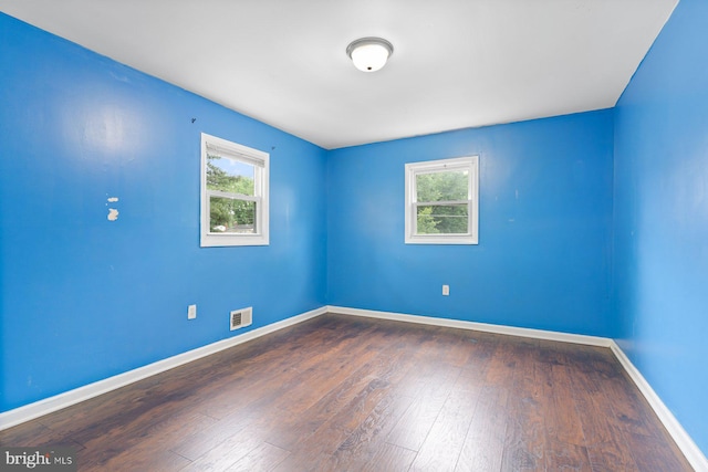 10700 Bickford Ave, Clinton, MD 20735 - unfurnished room featuring healthy amount of natural light, wood finished floors, and baseboards