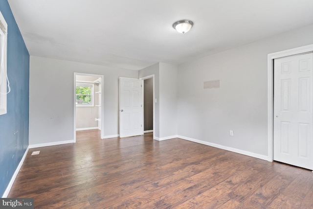 10700 Bickford Ave, Clinton, MD 20735 - empty room with baseboards and wood finished floors