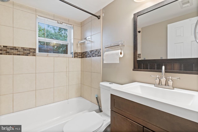 10700 Bickford Ave, Clinton, MD 20735 - bathroom featuring toilet, vanity, and shower / bathtub combination