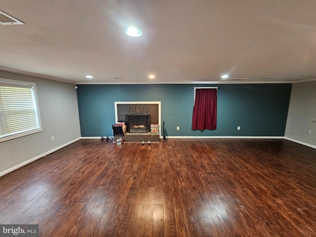 10700 Bickford Ave, Clinton, MD 20735 - unfurnished living room with wood finished floors, a fireplace, recessed lighting, baseboards, and crown molding