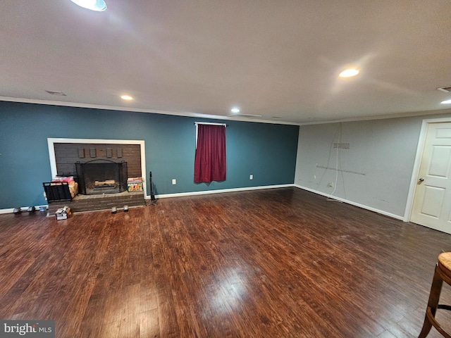 10700 Bickford Ave, Clinton, MD 20735 - unfurnished living room featuring wood finished floors, crown molding, recessed lighting, a fireplace, and baseboards