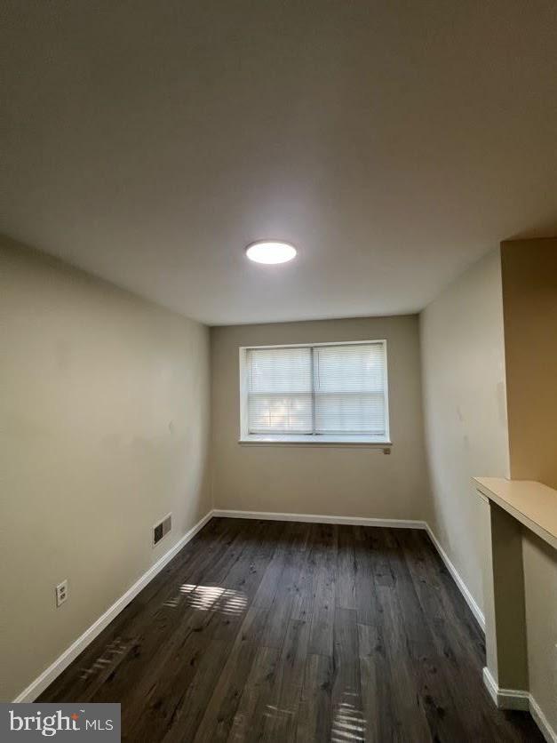 801 Christopher Dr, Reading, PA 19610 - spare room with dark wood finished floors and baseboards