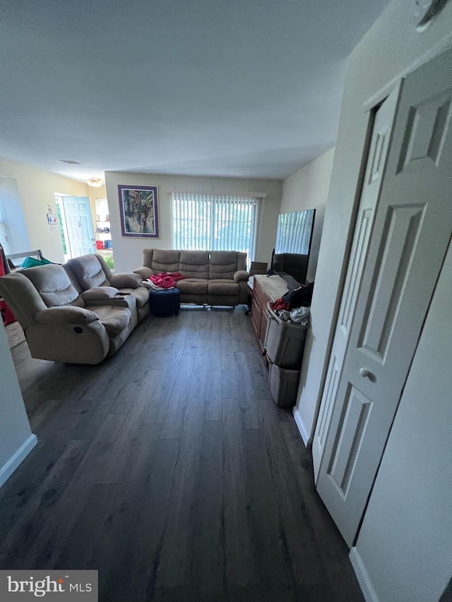 801 Christopher Dr, Reading, PA 19610 - living room with dark wood-style flooring and baseboards