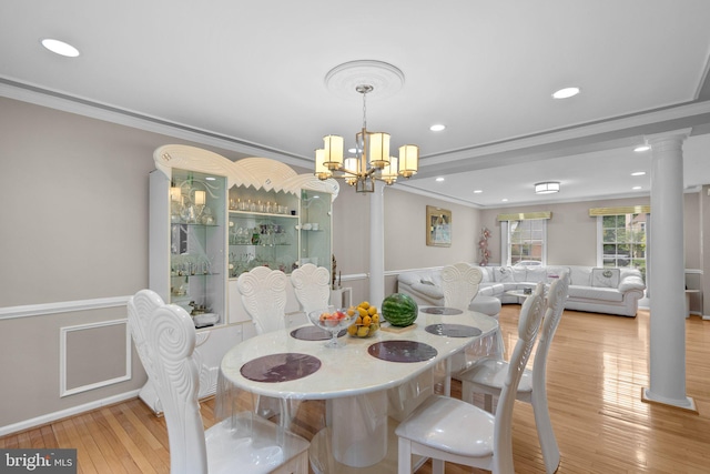 20008 Giantstep Ter, Gaithersburg, MD 20886 - dining area with ornamental molding, light wood-type flooring, a chandelier, recessed lighting, and ornate columns