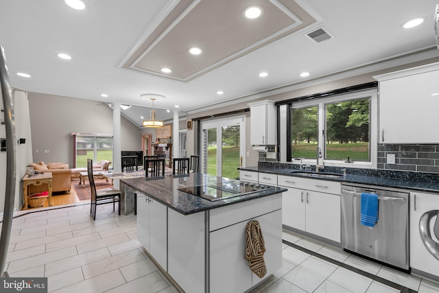 20008 Giantstep Ter, Gaithersburg, MD 20886 - kitchen with stainless steel dishwasher, a sink, black electric stovetop, light tile patterned flooring, and white cabinetry