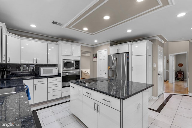 20008 Giantstep Ter, Gaithersburg, MD 20886 - kitchen featuring stainless steel appliances, inlaid floor details, crown molding, white cabinetry, and recessed lighting
