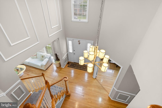 20008 Giantstep Ter, Gaithersburg, MD 20886 - entryway with hardwood / wood-style flooring, a high ceiling, and baseboards