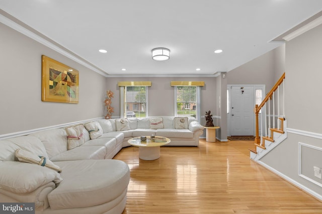 20008 Giantstep Ter, Gaithersburg, MD 20886 - living area featuring crown molding, light wood finished floors, stairs, and recessed lighting