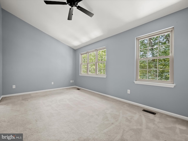 7301 Eden Brook Dr Unit A-1, Columbia, MD 21046 - carpeted empty room featuring a ceiling fan and vaulted ceiling