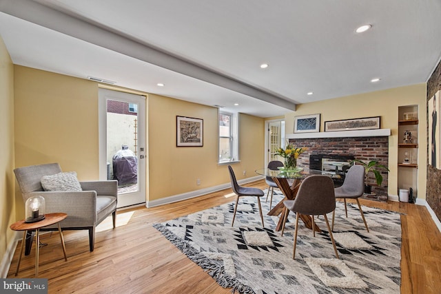 826 S 2nd St Unit 2, Philadelphia, PA 19147 - dining space with wood finished floors, a fireplace, baseboards, and recessed lighting