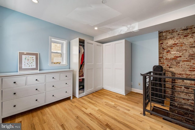 826 S 2nd St Unit 2, Philadelphia, PA 19147 - bedroom featuring light wood finished floors, brick wall, baseboards, and recessed lighting