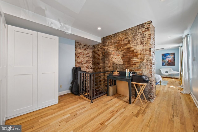 826 S 2nd St Unit 2, Philadelphia, PA 19147 - office featuring wood finished floors, baseboards, brick wall, and recessed lighting