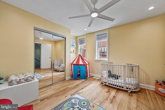 826 S 2nd St Unit 2, Philadelphia, PA 19147 - bedroom with wood finished floors, a closet, baseboards, a crib, and ceiling fan