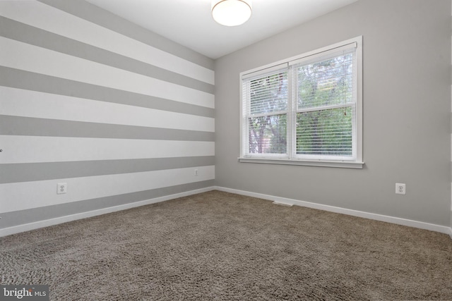 1423 1st St NW Unit B, Washington, DC 20001 - spare room featuring carpet and baseboards