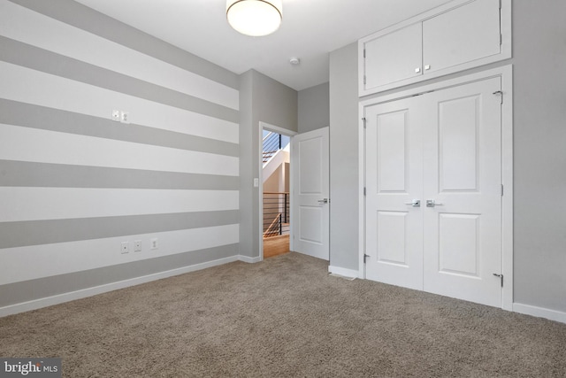 1423 1st St NW Unit B, Washington, DC 20001 - unfurnished bedroom featuring carpet, baseboards, and a closet