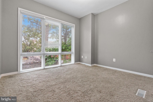 1423 1st St NW Unit B, Washington, DC 20001 - empty room featuring carpet floors and baseboards