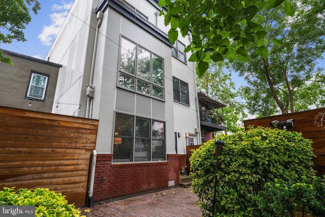 1423 1st St NW Unit B, Washington, DC 20001 - back of property with brick siding and stucco siding