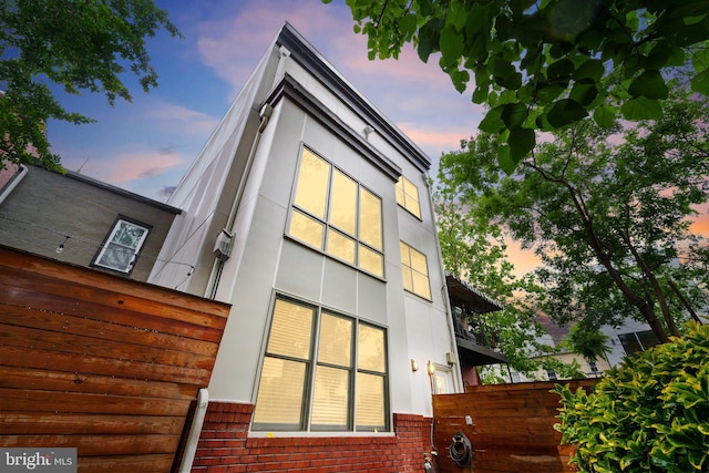 1423 1st St NW Unit B, Washington, DC 20001 - property exterior at dusk with brick siding and stucco siding
