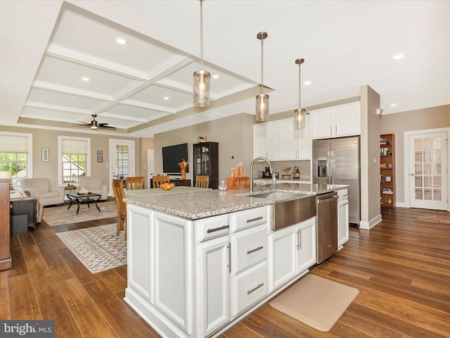 3218 Thornapple Dr, Frederick, MD 21704 - kitchen featuring stainless steel dishwasher, a sink, ceiling fan, coffered ceiling, and open floor plan