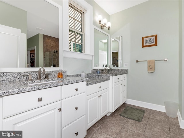 3218 Thornapple Dr, Frederick, MD 21704 - bathroom featuring double vanity, a stall shower, baseboards, and tile patterned flooring