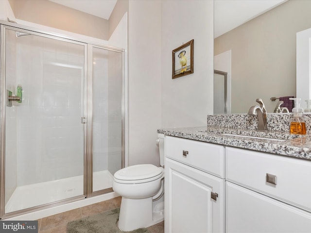 3218 Thornapple Dr, Frederick, MD 21704 - bathroom featuring toilet, vanity, a shower stall, and tile patterned flooring