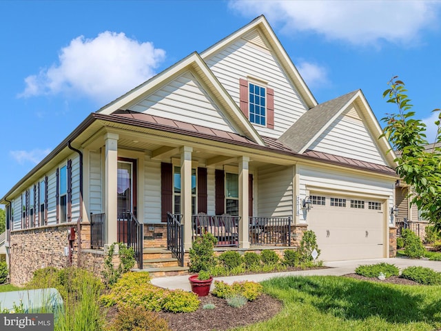 3218 Thornapple Dr, Frederick, MD 21704 - craftsman-style house featuring covered porch, a standing seam roof, driveway, a garage, and metal roof