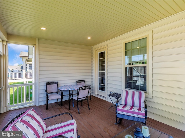 3218 Thornapple Dr, Frederick, MD 21704 - wooden terrace with outdoor dining area